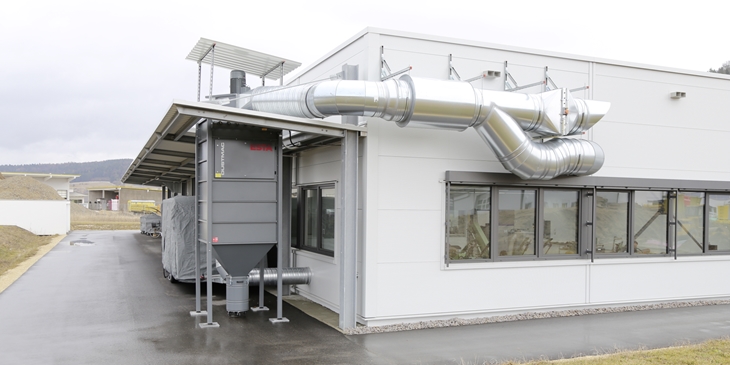 Stationaire, centrale afzuiger met grote luchtvolumereservoirs